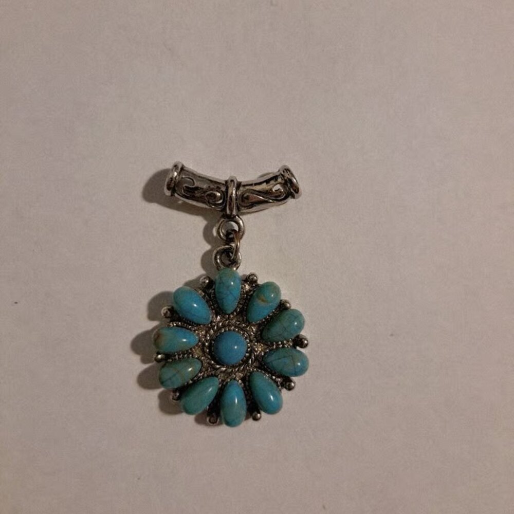 Silver Round Costume Jewelry Pendant With Turquoise Colored Accents